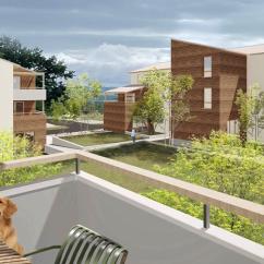 Résidence Auz’village à Auzeville-Tolosane, vue depuis un balcon sur les logements participatifs et espaces verts