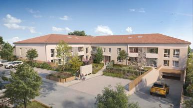 Vue extérieure de la résidence Bleu Azur à Cornebarrieu : appartements neufs en BRS avec toiture en tuiles, espaces verts aménagés et accès parking