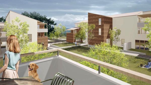 Résidence Auz’village à Auzeville-Tolosane, vue depuis un balcon sur les logements participatifs et espaces verts